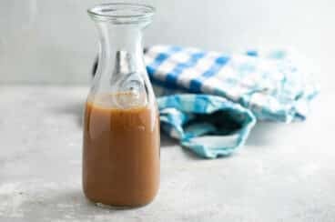 Caramel sauce in a carafe.