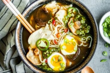 Chicken ramen in a bowl with chopsticks.
