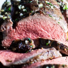 A sliced roast beef tenderloin.
