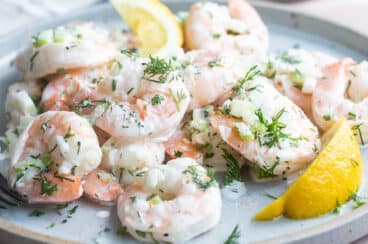 Shrimp salad on a blue plate.